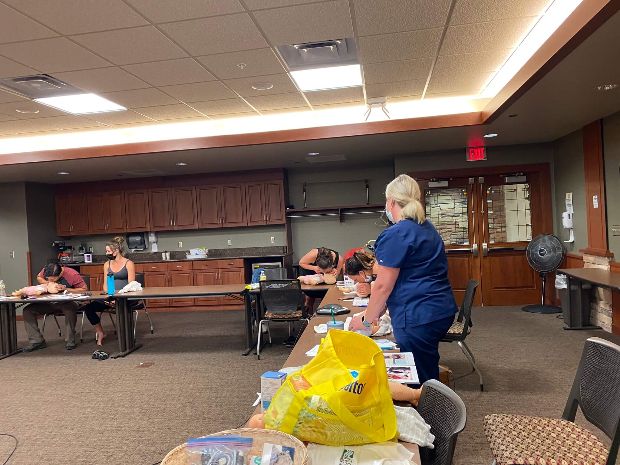 nurse teaching an expectant parenting class